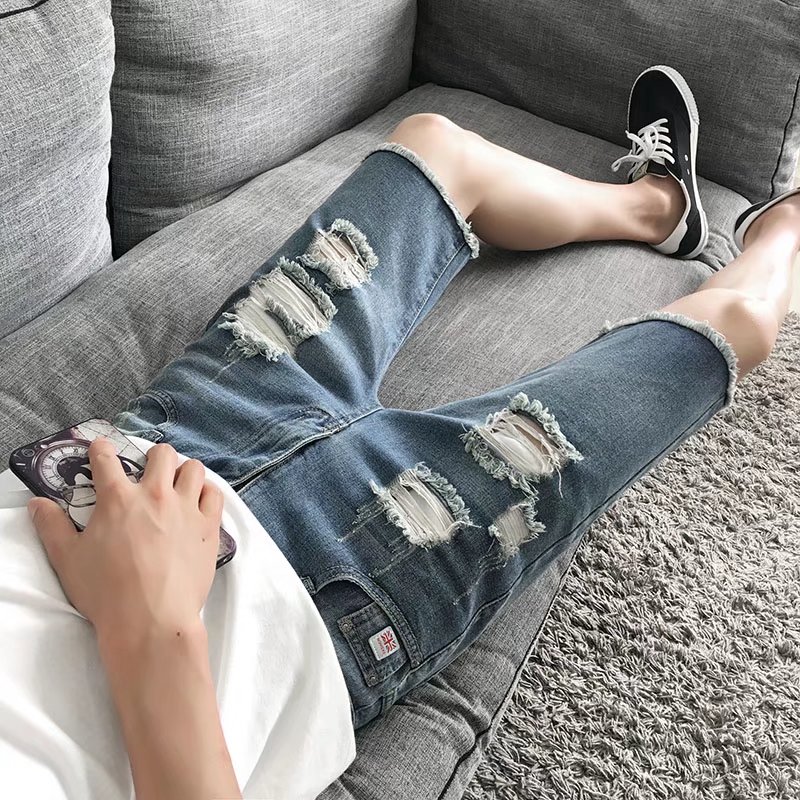 l'été de nouveaux hommes denim shorts des hommes version coréenne de slim trou de cinq garçons de pantalon de marée à 5 minutes de pantalon l'été de nouveaux hommes denim shorts des hommes version coréenne de slim trou de cinq garçons de pantalon de marée à 5 minutes de pantalon
