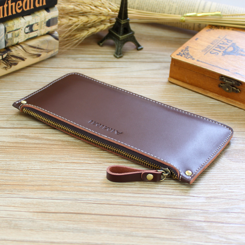 vintage ultra mince longue section de cuir véritable mens wallet simple doux cuir de vachette fermeture à glissière sac de téléphone portable sac de nouveau ladies clutch bag vintage ultra mince longue section de cuir véritable mens wallet simple doux cuir de vachette fermeture à glissière sac de téléphone portable sac de nouveau ladies clutch bag