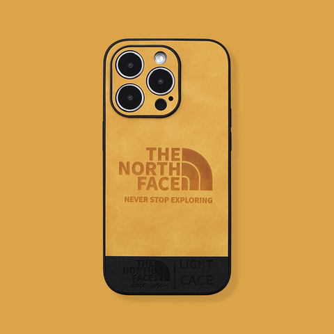 Yellow — The North Face New Faux Leather 14, 13, 12 iPhone Case