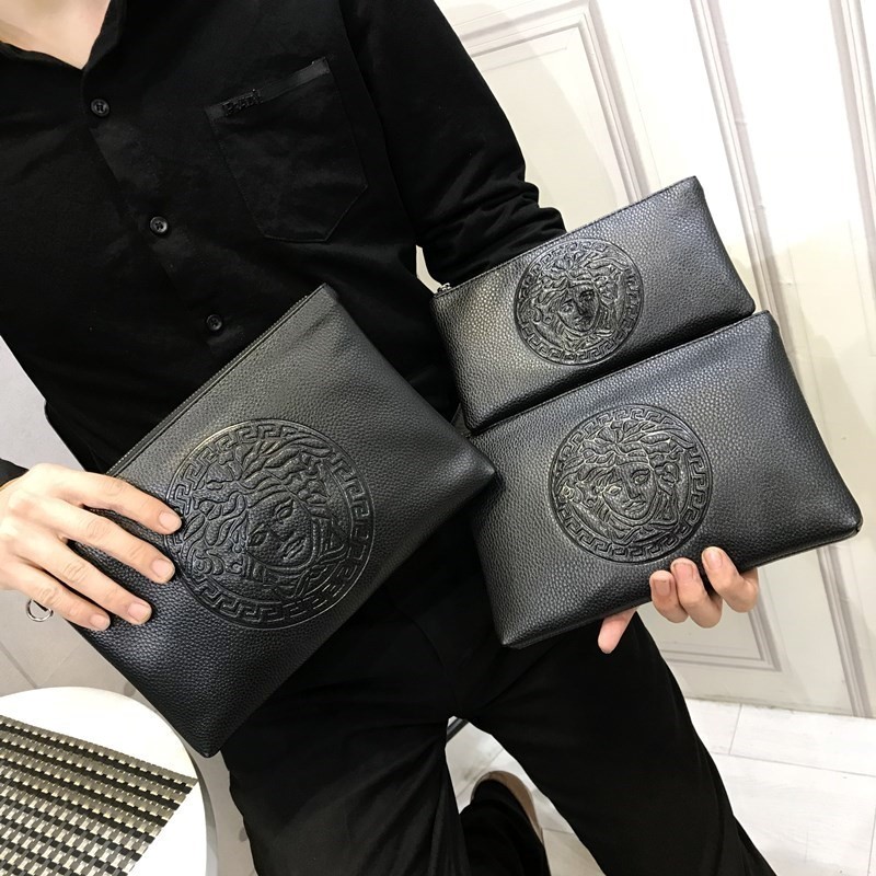 sacs à main hommes 2019 sociale en cuir souple, de nouveau produit enveloppe sac de méduse sac pochette noir imprimé floral affaires à la main clip de transport de colis sacs à main hommes 2019 sociale en cuir souple, de nouveau produit enveloppe sac de méduse sac pochette noir imprimé floral affaires à la main clip de transport de colis