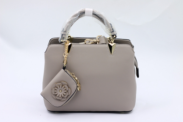 正品2017新款蜘蛛王女包单肩斜挎手提包95-160901401吊牌价398元