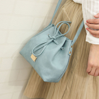 包邮雨伞包水桶单肩包2016新款韩版女式包袋系绳铁牌斜挎潮流包包