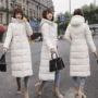 Chống mùa bông phụ nữ dài phần trên đầu gối 2018 mùa đông mới Hàn Quốc phiên bản của xuống bông đệm mỏng kích thước lớn bông áo khoác áo khoác mũ lông nữ