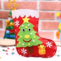 Không dệt DIY handmade sáng tạo vớ Giáng sinh Cha mẹ trẻ con câu đố thủ công dán vật liệu đẹp Santa Claus đồ chơi siêu nhân