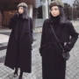 Áo khoác len nữ màu đen dài phần phiên bản Hàn Quốc 2018 mới thu đông và eo mùa đông đã mỏng qua dây đeo đầu gối áo khoác len áo khoác choàng nữ