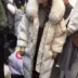 Chống mùa giải phóng mặt bằng mùa đông Hàn Quốc Dongdaemun lớn cổ áo lông thú lỏng dài xuống áo khoác phụ nữ trên đầu gối dày coat kích thước lớn