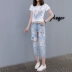 Trạm châu âu 2018 mùa xuân và mùa hè mới của phụ nữ hoa T-Shirt + jeans giản dị hai mảnh thời trang phù hợp với nữ triều quần jean rách hàn quốc Quần jean