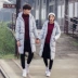 Áo khoác cotton mùa đông Phiên bản Hàn Quốc của áo khoác mỏng nam và nữ trong phần dài trên đầu gối trùm xuống áo khoác cotton nam Trang phục Couple
