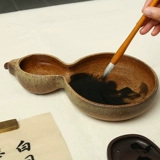 Тыква совка -в форме грубой глиняной посуды для мытья ручки.