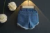 2018 mới của Hàn Quốc phiên bản của cô gái mùa hè quần short trong trẻ em tua rửa nước mềm jeans quần nóng thủy triều quần jean dầy thu đông cho bé Quần jean