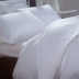 Khách sạn bộ đồ giường cotton khách sạn màu rắn màu hồng màu xanh gối satin bông gối khách sạn số lượng lớn tóc