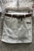 Mùa hè năm 2021 mới trắng rách túi denim túi đeo hông Váy cạp thấp Hàn Quốc nữ váy ngắn váy một bước gợi cảm - Váy