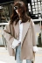 Hàn quốc Dongdaemun quá khổ siêu lỏng kích thước lớn phù hợp với áo khoác của phụ nữ ngắn retro giản dị phù hợp với BF gió quần áo nữ Business Suit