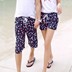 Couple bãi biển quần kỳ nghỉ bên bờ biển Hàn Quốc nam giới và phụ nữ lỏng lẻo khô nhanh kích thước lớn năm điểm quần short mùa hè quần âu thủy triều 	quần áo đi biển hà nội	 Quần bãi biển