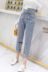 2018 thu đông mới Hàn Quốc giản dị quần jeans lưng cao nữ thời trang cà vạt mỏng lỗ chín quần thủy triều quan bo nu Quần jean