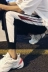 LES đẹp trai T màu sắc kết hợp chữ lỏng quần nam rừng uốn cong Phiên bản Hàn Quốc của thanh niên thể thao hoang dã sang trọng Crop Jeans
