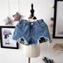 Quần short trẻ em vừa và nhỏ quần short 2018 mùa hè cô gái mới hoang dã giản dị lưới denim trẻ em của denim liệu nóng quần Quần jean