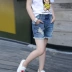 Cô gái lớn 2018 mùa hè mới rửa vụn quần short denim hot quần trẻ em Hàn Quốc phiên bản mặc quần short triều phụ nữ shop quan ao baby Quần jean