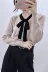 Phiên bản Hàn Quốc đơn giản với kiểu dáng cổ yếm ngọt ngào tương phản nơ dài tay áo len nữ mùa thu đông mới len áo len cổ cao Cardigan