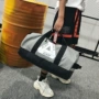 Túi du lịch Hàn Quốc không thấm nước dung lượng lớn túi du lịch nhẹ nam và nữ xách tay thể thao túi thể thao túi xi lanh Túi Messenger túi du lịch nữ hàng hiệu