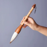 Волк Джиджин захватывает ручку, схватив ручку, ручку, жесткую овцу и Союз, крупные персонажи, название каллиграфии, создание каллиграфии