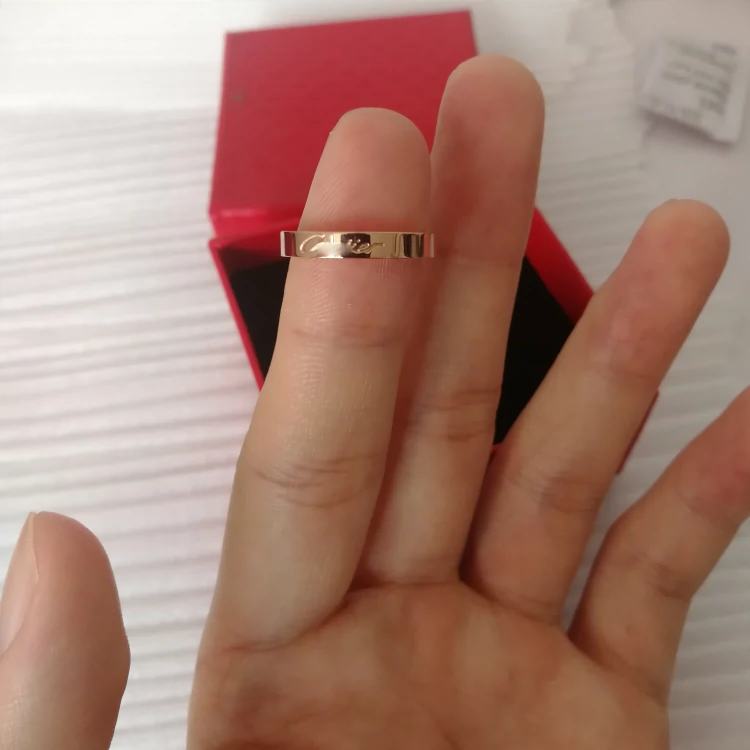 Phiên bản tiếng Nhật và Hàn Quốc của xu hướng nhẫn kim cương đơn titan bằng kim cương đơn giản cho cặp đôi nhẫn đôi mô phỏng nhẫn cưới vàng hồng không phai - Nhẫn