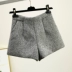 Quần short len ​​đen nữ mùa thu đông 2018 phiên bản mới của Hàn Quốc diện quần lửng ống rộng ống rộng mặc hoang dã quần sọt kaki nữ Quần short