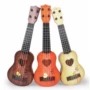 Gửi dây Gửi hướng dẫn Đồ chơi guitar cho trẻ em có thể chơi nhạc cụ mô phỏng ukulele vừa mới bắt đầu - Đồ chơi nhạc cụ cho trẻ em trống đồ chơi