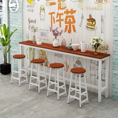 Заблокирован столом на стенах, простая домашняя гостиная, современный магазин с длинным молочным чай