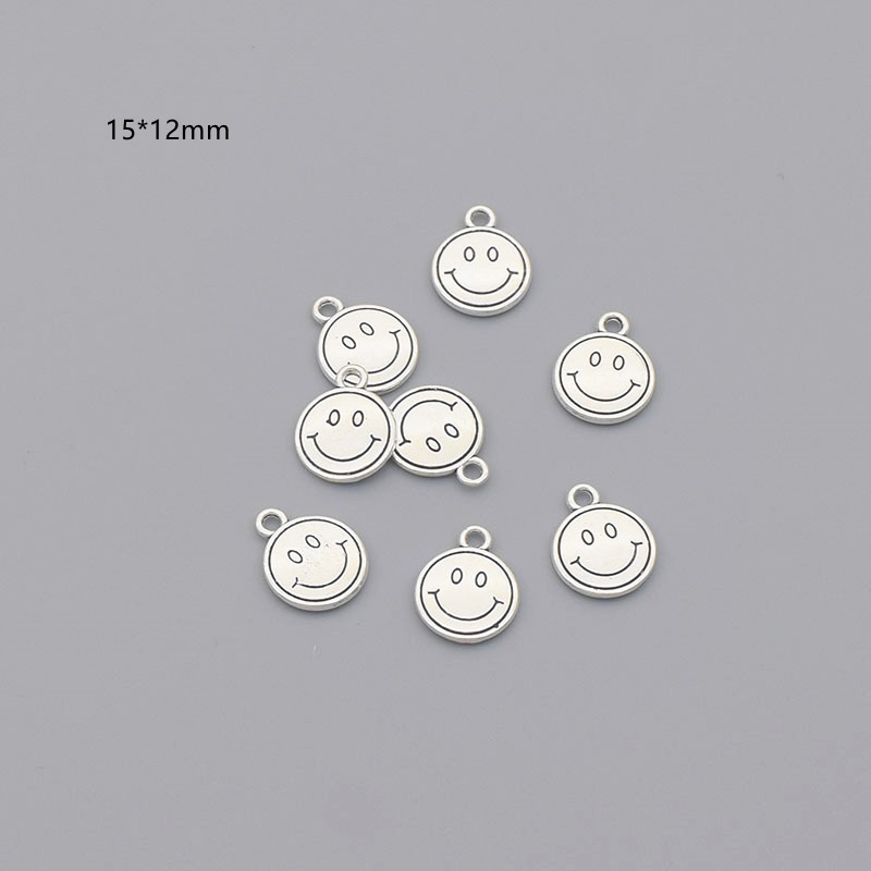 1 Smiling FaceDIY ornaments parts alloy Retro Ancient silver smiling face Spoon scissors self-control Necklace Earrings Pendants Pendant