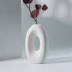 Bắc Âu tối giản bình gốm trắng chậu hoa thiết kế rỗng trang trí mềm mại phòng khách hiên nhà mô phỏng cắm hoa