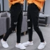 Quần áo mùa xuân và mùa thu cho bé gái Quần jeans nhỏ mùa xuân Quần bé gái mặc ngoài quần trẻ em màu đen Triều Tiên - Quần jean