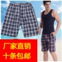 Quần short nam trung niên polyester cotton giặt thẳng nhiều túi quần nam giản dị bãi biển 5 quần nam bán buôn quần âu