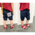 Tinky trẻ em quần áo trẻ em của dán chương denim quần short trai năm điểm hot quần mùa hè mới lớn trẻ em của triều quần Quần jean