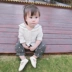Mùa xuân mới quần áo trẻ em Hàn Quốc nữ áo sơ mi cotton dài tay trẻ sơ sinh cô gái áo sơ mi trắng phim hoạt hình thủy triều