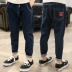 Quần jeans bé trai mùa thu chân mùa xuân và mùa thu mẫu bé trai thủy triều phiên bản Hàn Quốc của quần dài denim trẻ em tự tu - Quần jean Quần jean