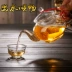 Mini ấm trà thủy tinh chịu nhiệt hoa ấm trà trong suốt Kung Fu bộ trà lọc trà maker home trumpet bình trà giữ nhiệt Trà sứ