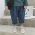 Xuân 2019 trai mới phiên bản Hàn Quốc của quần harem bé gái quần cà rốt trẻ em quần jean mềm bé quần rộng