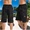 Quần nhiều túi nam cắt quần ngắn giản dị mạnh mẽ mặc quần ngụy trang bãi biển quần yếm mùa hè quần rộng kích thước lớn quần sooc