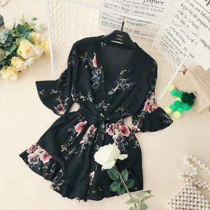 Châu âu và Mỹ phong cách 2018 mới V-Cổ eo cao tie cao eo là mỏng thời trang in chân rộng quần short bãi biển jumpsuit