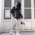 Áo mới 2018 màu bạc xuống áo khoác nữ mặt sáng thời trang tay áo ngắn tay rộng không gian trùm đầu xuống áo khoác phiên bản Hàn