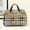 Túi du lịch xách tay bằng da PU mới cho nam và nữ khoảng cách ngắn công suất lớn túi hành lý kinh doanh một túi du lịch