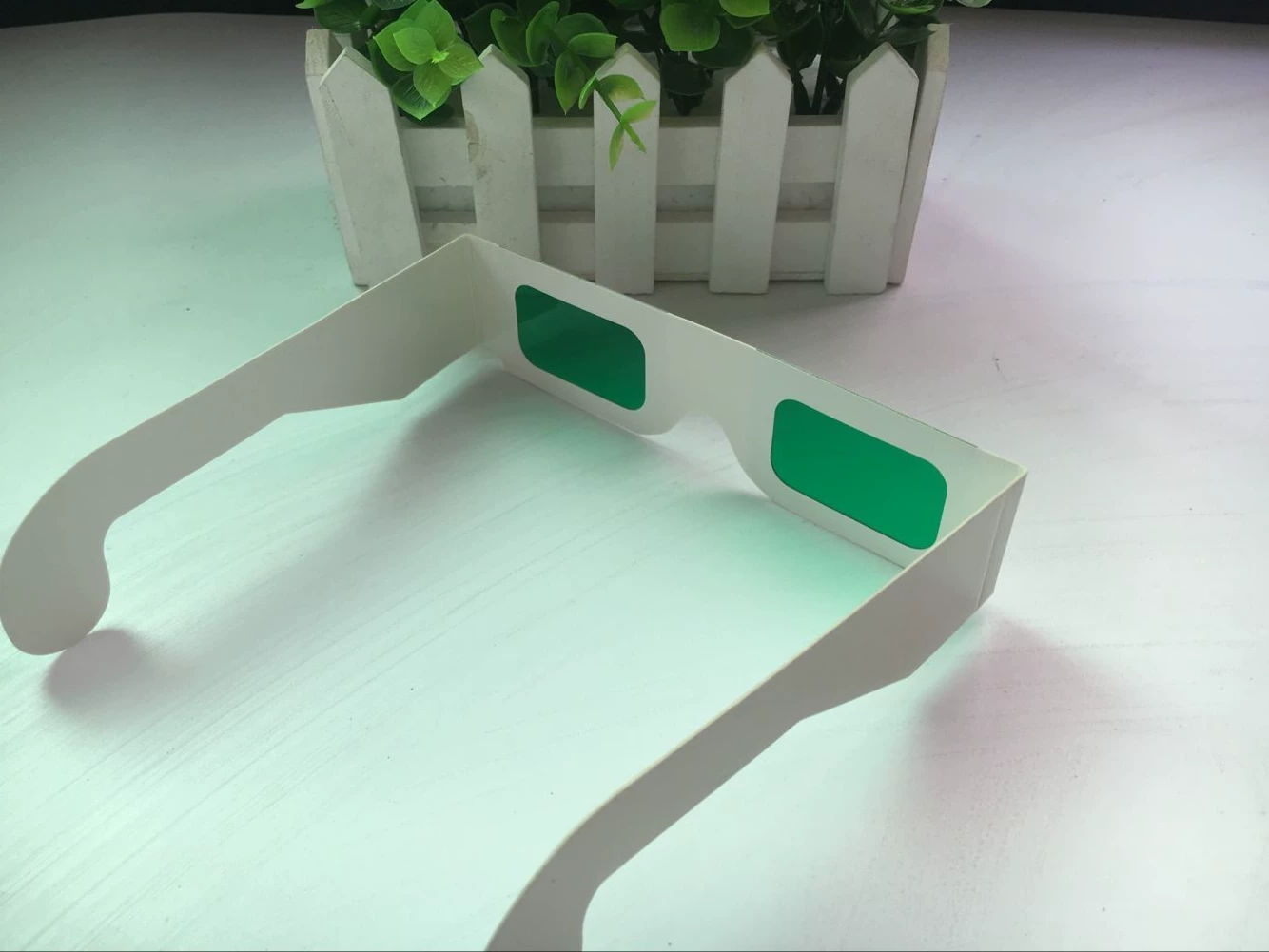 Lens, disposable green glasses