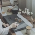 Khay trà đá vàng đen Kung Fu Bộ trà Bộ bàn trà nhỏ gia đình Nhật Bản trà đơn giản biển trà đạo hoàn toàn tự động một
