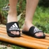 Giày đế bệt đơn giản Adidas Adilette Comfort Dép đi biển thông thường CG3425 - Dép thể thao
