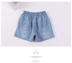 Quần short nữ denim mùa hè mỏng phần quần áo trẻ em Hàn Quốc hoang dã trong quần trẻ em lớn cotton trẻ em quần nóng - Quần jean