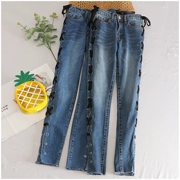 Taotao quần áo mùa hè Hàn Quốc thời trang thấp eo tie rửa chân jeans nữ 30422