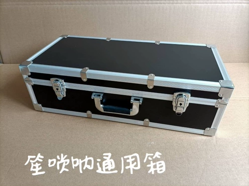 Черная металлическая коробка, разнообразные музыкальные инструменты, алюминиевый сплав