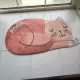Фальшивый спящий кот апельсин