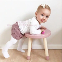 INS bé trẻ em đồ nội thất phòng gỗ rắn bàn ghế Bắc Âu phong cách vòng phân đạo cụ chụp ảnh bàn tròn bảng trò chơi ghế ăn cho bé